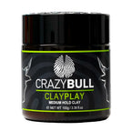 Black jar of Crazy Bull Clay Play hair product on a white background
